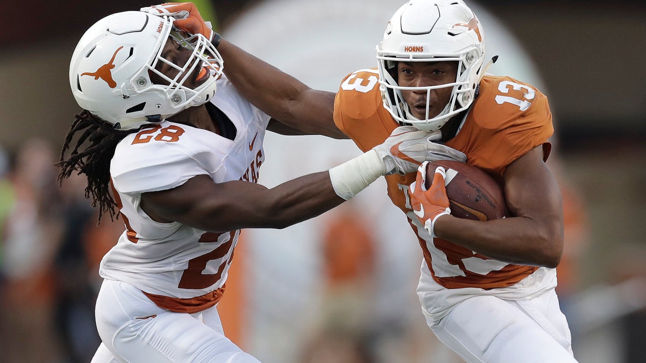 Once Texas' breakout QB, Heard quietly ending career as WR